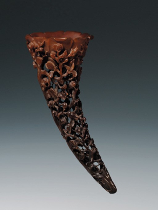 A RHINOCEROS HORN LIBATION CUP
