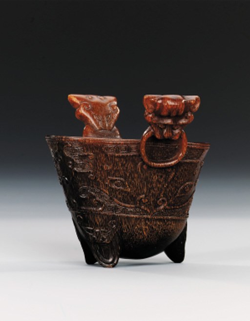 A VERY FINE AND RARE RHINOCEROS HORN LIBATION CUP, JUE