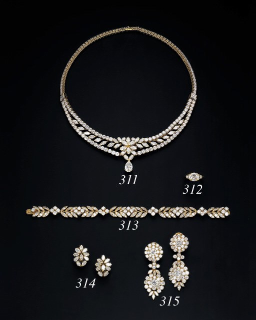 A PAIR OF DIAMOND EAR-PENDANTS