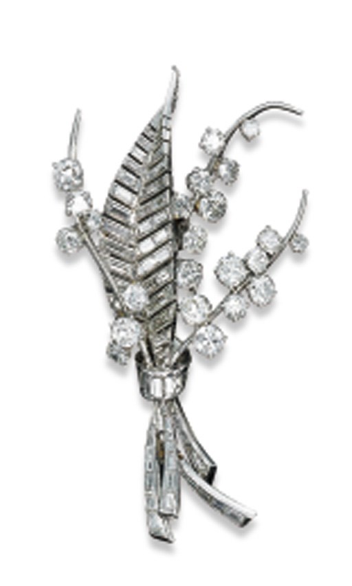 A DIAMOND CLIP BROOCH