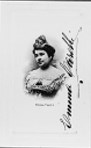 CARELLI, Emma (1877-1928). Fotografia della soprano napoletana, grande interprete del repertorio verista, al recto di cartolina postale con cornicette in rilievo. Firma autografa.