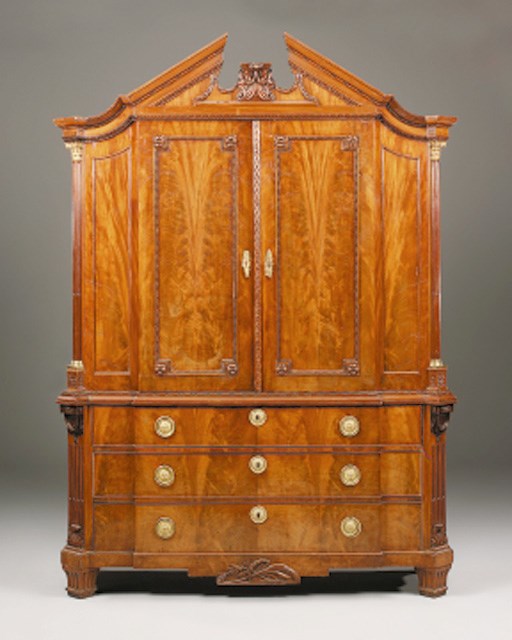 A Dutch mahogany linen press or gentlemans wardrobe, late 18th/early 19th century