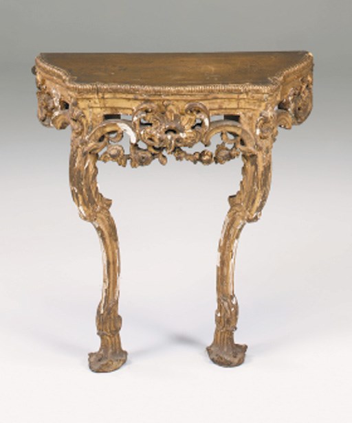 A carved giltwood console, 18th century and later, possibly French or German