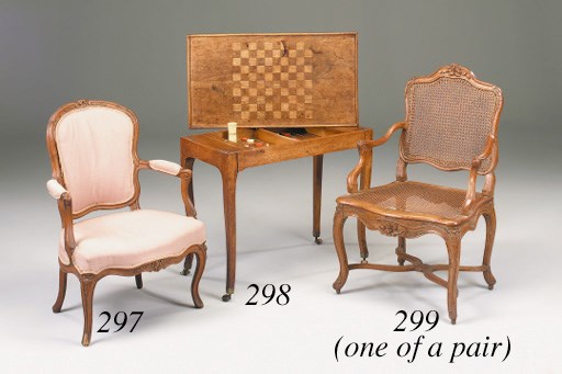 A pair of Regence carved beechwood fauteuils a la reine