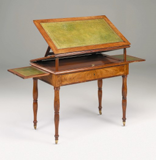 A Charles X mahogany draughtsman or architects table
