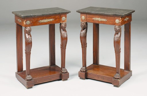 A pair of Empire mahogany and ormolu-mounted console tables