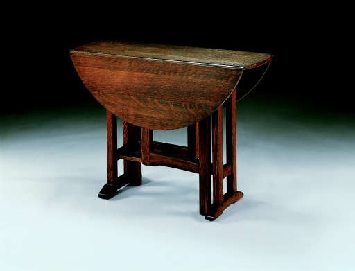 AN OAK DROP-LEAF TABLE