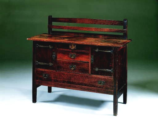 AN OAK SIDEBOARD