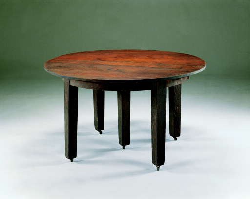 AN OAK DINING TABLE