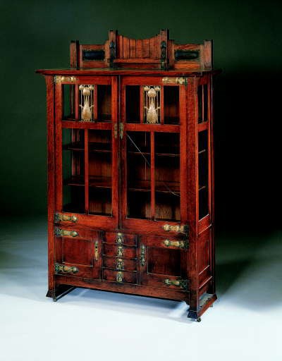 AN OAK CHINA CABINET