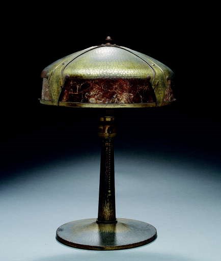 A BRASS-WASHED HAMMERED COPPER AND MICA TABLE LAMP