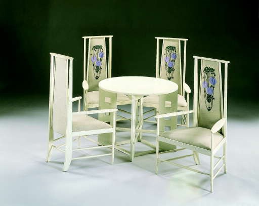 A CONTEMPORARY WHITE-PAINTED DINING SUITE