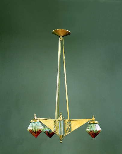 A THREE-LIGHT BRASS AND IRIDESCENT GLASS CHANDELIER