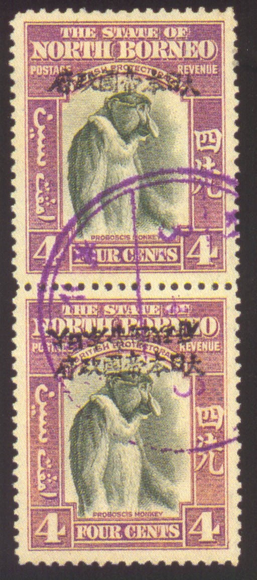 used  -- 4c. bronze-green and violet with handstamp in black, a vertical pair with the lower stamp showing variety overprint double, one inverted, neatly sharing c.d.s. in violet; rare. S.G. J4a. Photo
