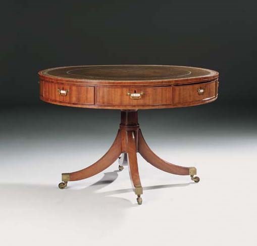 A GEORGE III MAHOGANY LIBRARY DRUM TABLE