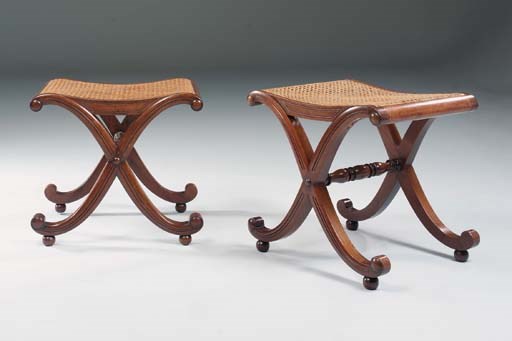 A MATCHED PAIR OF REGENCY MAHOGANY X-FRAME STOOLS