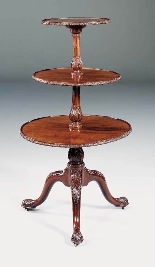 A GEORGE II MAHOGANY THREE-TIER DUMB WAITER