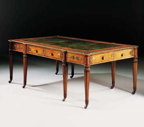 A REGENCY BRASS-INLAID AND ORMOLU-MOUNTED MAHOGANY WRITING-TABLE