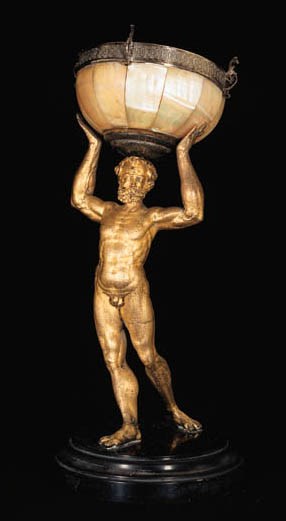 A GILT-BRONZE FIGURE OF ATLAS SUPPORTING A SILVER-MOUNTED MOTHER-OF-PEARL BOWL
