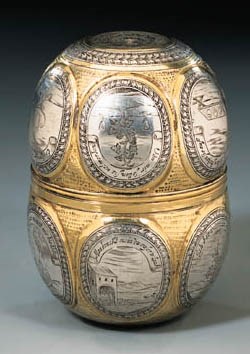 A GERMAN PARCEL-GILT AND NIELLOED DOUBLE BEAKER