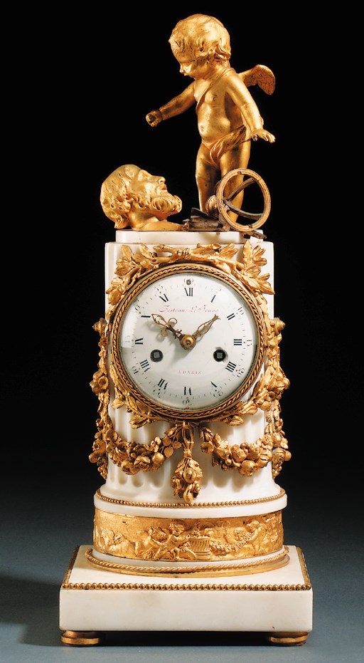 A LOUIS XVI ORMOLU-MOUNTED WHITE MARBLE CLOCK