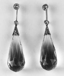 A pair of aquamarine and diamond earrings,