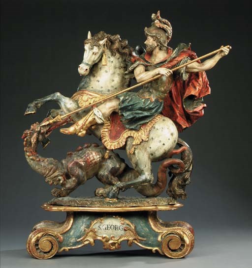 A large polychrome carved wood group of St George and the Dragon, probably South German, early 19th century