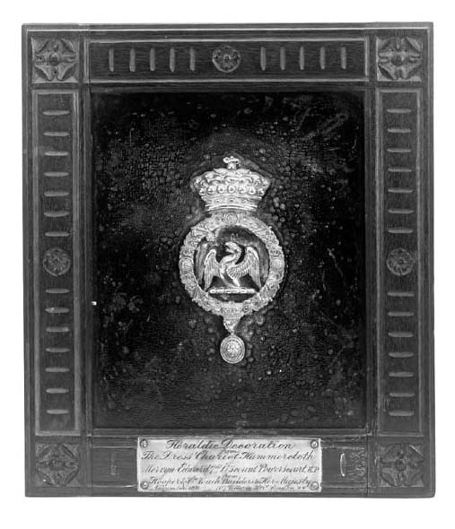 A heraldic carriage panel, late 19th century