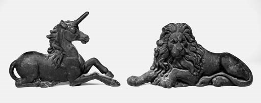 A pair of cast iron firedogs, 19th century