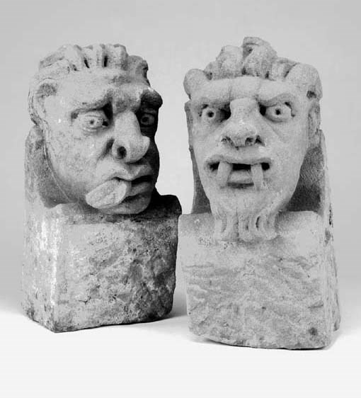 Two carved stone corbels, 19th century
