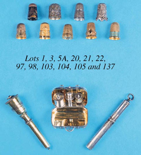 A silver-gilt combination thimble and needle-case,
