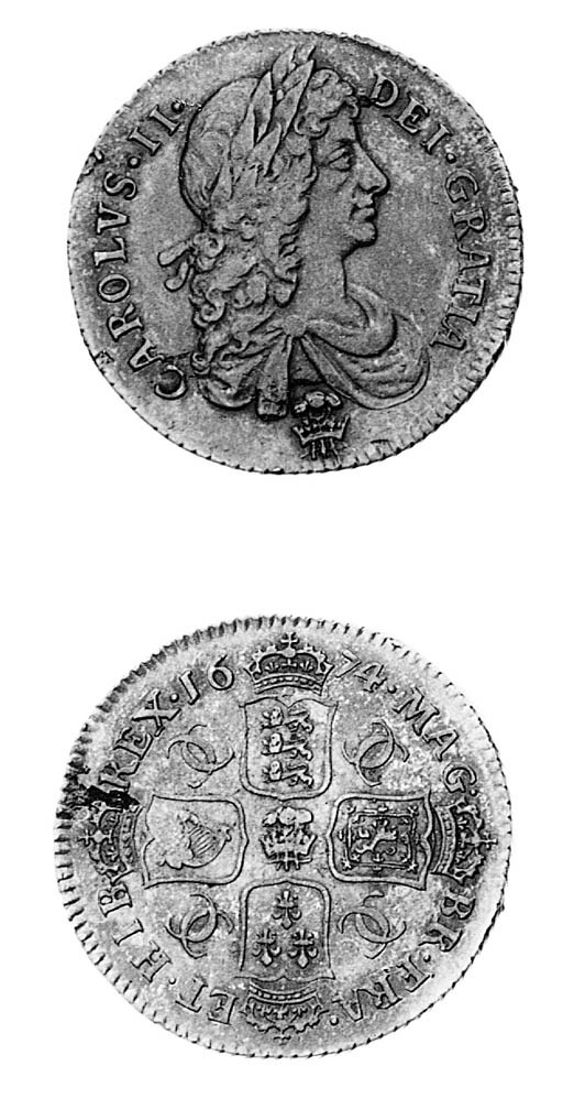 Charles II, Shilling, 1674, similar to preceding coin, with plume below bust and in centre of reverse (ESC 1040 R2; S.3376), metal flaw on reverse, toned very fine and very rare