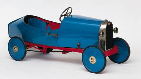 Bugatti - A good child's pedal car in the likeness of a "Grand Prix" racing car by Eureka; detail features include spring front suspension, chrome-plated radiator with enamel badge, adjustable seat and pedals, electric lights and decorative dashboard layout; restored original example; French c1920s Length 53ins (135cm)