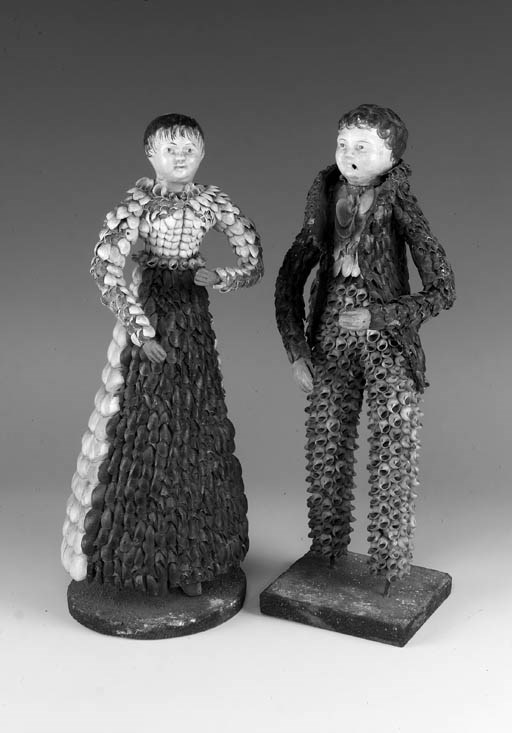 A pair of Sonneberg papier mâché-headed dolls