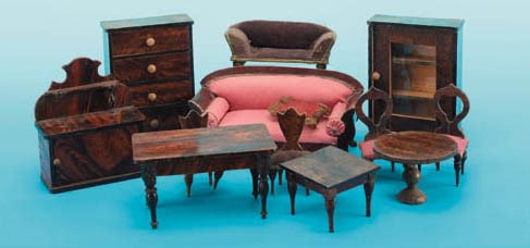 A group of varnished furniture