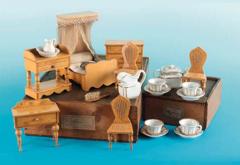 A part set of dolls' bedrooom furniture