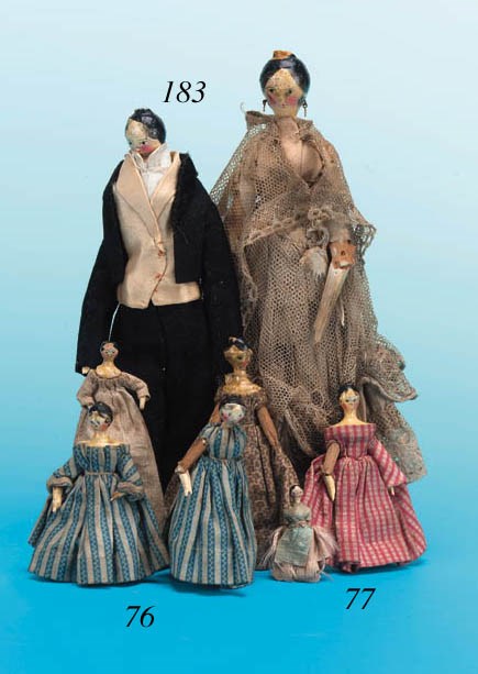 Two painted wooden Grodnerthal dolls