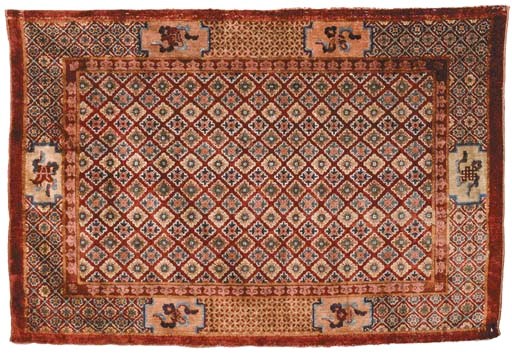 A SILK PEKING CARPET