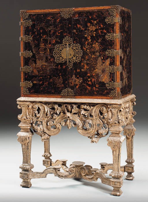 A WILLIAM AND MARY SIMULATED TORTOISESHELL AND GILT-JAPANNED CABINET ON A LACQUERED SILVER-GILT STAND