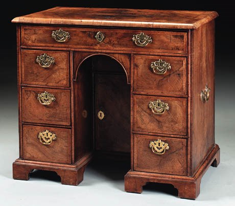 A WILLIAM III WALNUT KNEEHOLE DESK