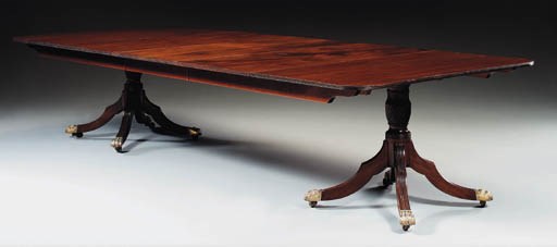 A LATE GEORGE III MAHOGANY TWO-PEDESTAL DINING-TABLE