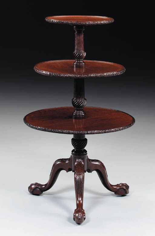 A GEORGE II MAHOGANY THREE-TIER DUMBWAITER