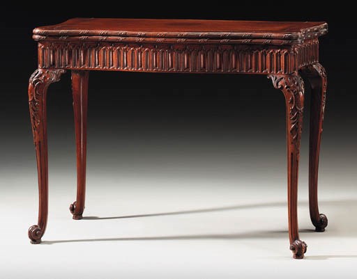 A GEORGE II MAHOGANY CONCERTINA-ACTION GAMES TABLE