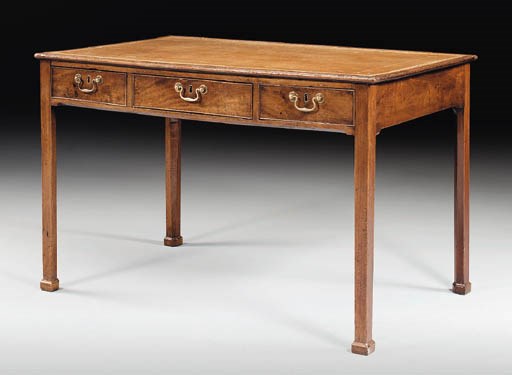 A GEORGE III MAHOGANY WRITING-TABLE