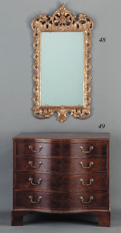 A GEORGE III MAHOGANY CHEST-OF-DRAWERS