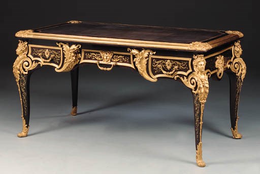 A Napoleon III ormolu-mounted ebony and ebonised bureau plat