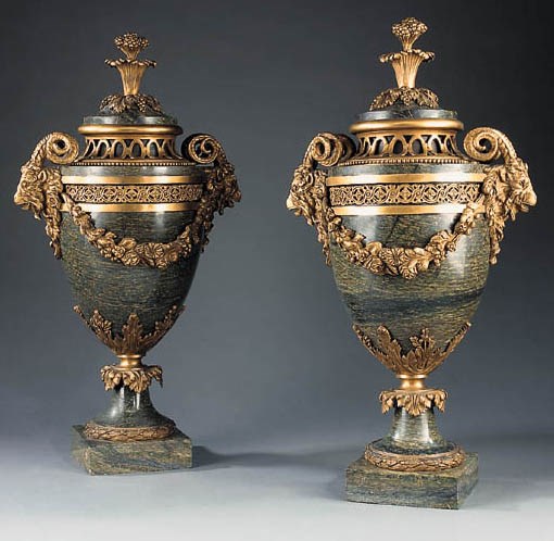 A pair of French ormolu-mounted verde Antico marble urns