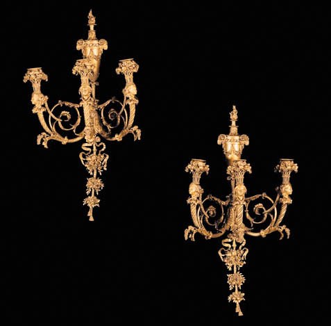 A pair of gilt-bronze three-light wall appliques