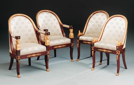 A set of four French ormolu-mounted mahogany chairs