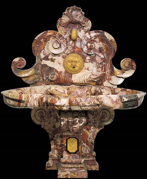 An Italian brecciato, giallo and nero antico marble wall-fountain